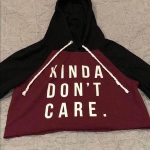 A burgundy and black Cropped hoodie